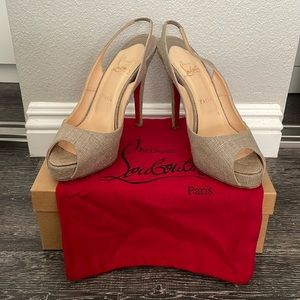 Christian Louboutin Juta Laminata heels in a silver. Size 39.5 (9.5 us).